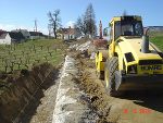 Verlegen der Steine im Beton © bblhb Verlegen der Steine im Beton © bblhb
