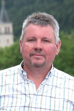 Das Portraitfoto von Herrn Markus Freigaßner