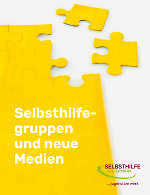 Gelbes Puzzel mit zwei losen Puzzelteilen